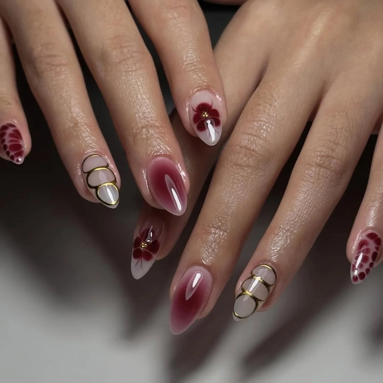 24pcs Women'S Nail Set Burgundy Almond Shape Medium Length Solid Color with Floral Golden Dust Design Fake Nails for Women/Girls